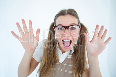 Female geeky hipster smiling at camera