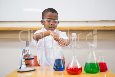 Cute pupil looking at liquids