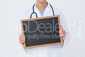 Doctor showing little blackboard