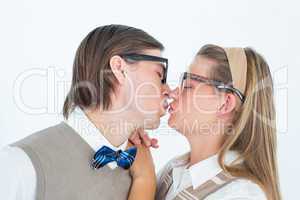 Geeky hipster couple kissing