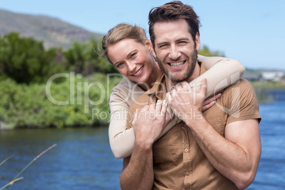 Happy couple at a lake