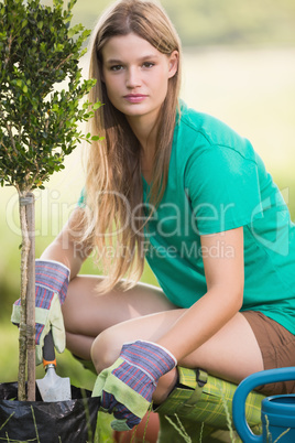 Pretty blonde gardening for her community