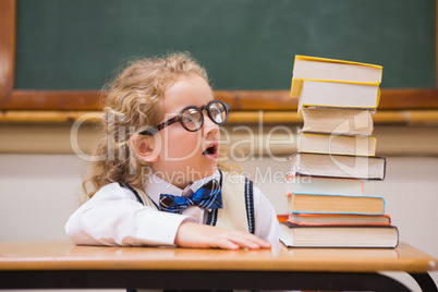 Surprise pupil looking at books