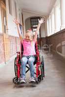 Cute disabled pupil smiling in hall