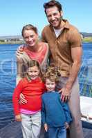 Happy family at a lake