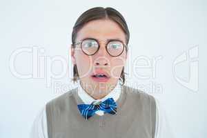 Geeky hipster looking surprised at camera