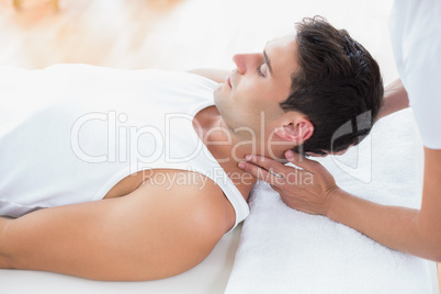 Man receiving neck massage