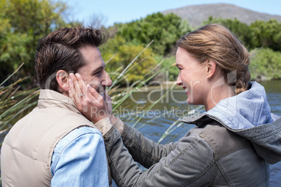 Happy couple at a lake