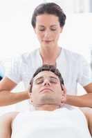 Man receiving neck massage