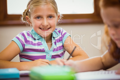 Pupils working hard at desk