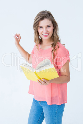 Hipster woman holding book