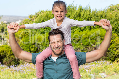 Father and daughter having fun