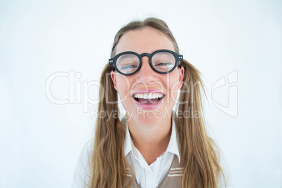 Female geeky hipster smiling at camera