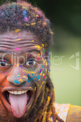 Hipster covered in powder paint