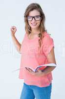 Hipster woman holding notebook