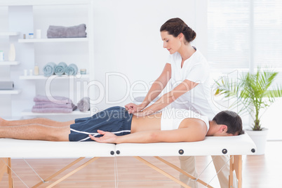 Physiotherapist doing back massage