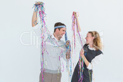 Happy geeky couple dancing