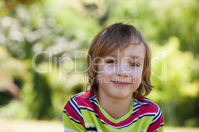 Happy little boy in the park