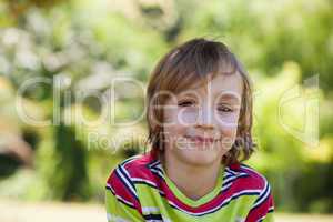 Happy little boy in the park