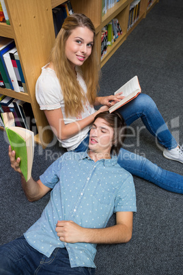 Students reading together in the library