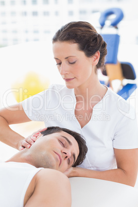 Man receiving neck massage