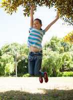 Cute little girl jumping up