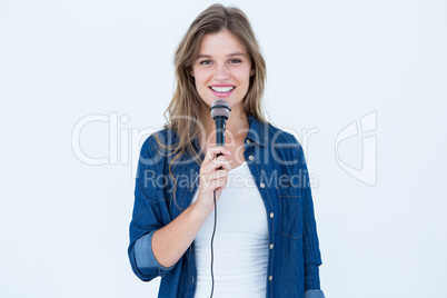 Woman singing with a microphone