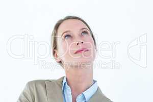 Thoughtful businesswoman in suit