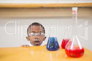 Shocked pupil looking at liquids