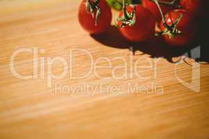 Cherry tomatoes on chopping board