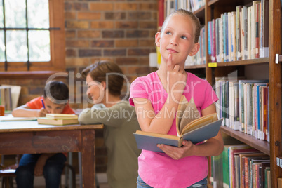 Thoughtful pupil at library