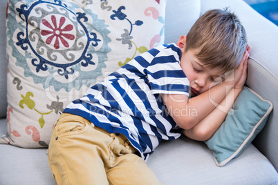 Little boy sleeping on the couch