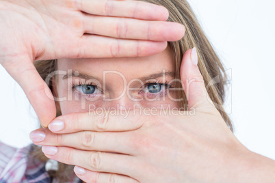 Pretty hipster doing frame with her hands