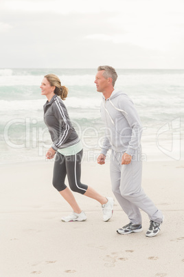 Fit couple jogging together