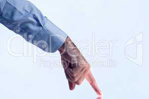 Man pointing on reflective surface