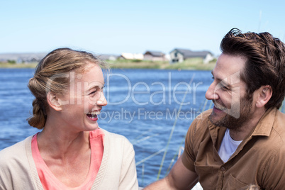 Happy couple at a lake