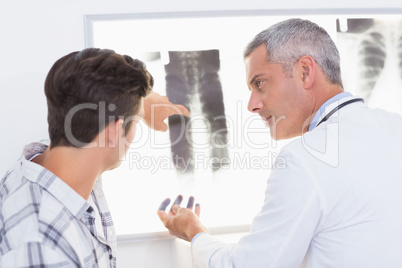 Doctor explaining X rays to his patient