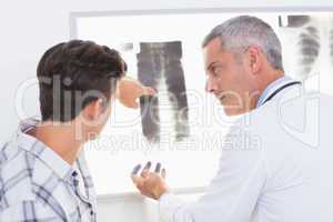 Doctor explaining X rays to his patient