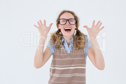 Geeky hipster woman smiling and showing her hands