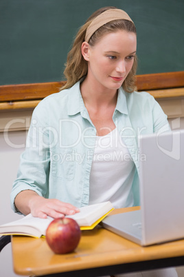 Focus teacher at her desk