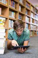 Student lying on library floor