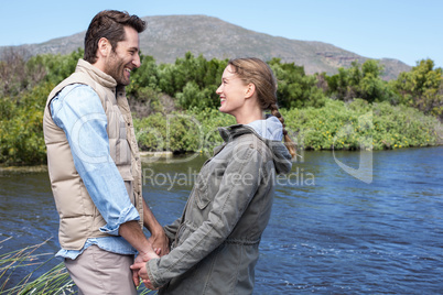 Happy couple at a lake