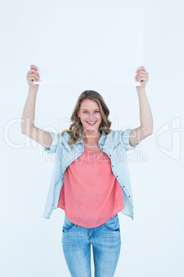 Woman holding poster