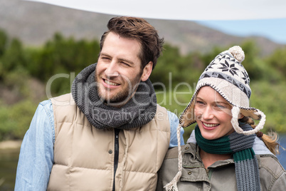 Happy casual couple at a lake