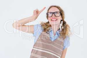 Geeky hipster woman pointing up