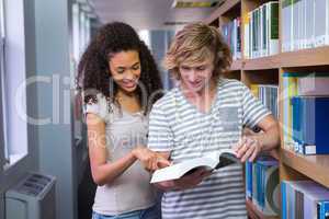 Students reading together in the library