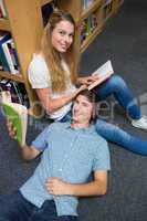 Students reading together in the library