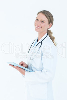 Doctor using tablet pc