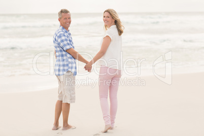 Casual couple smiling at camera