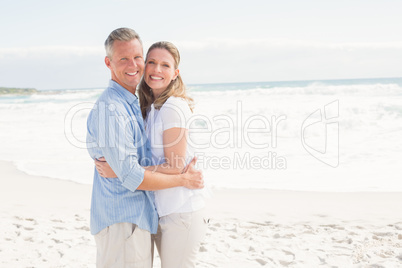 Happy couple smiling at camera